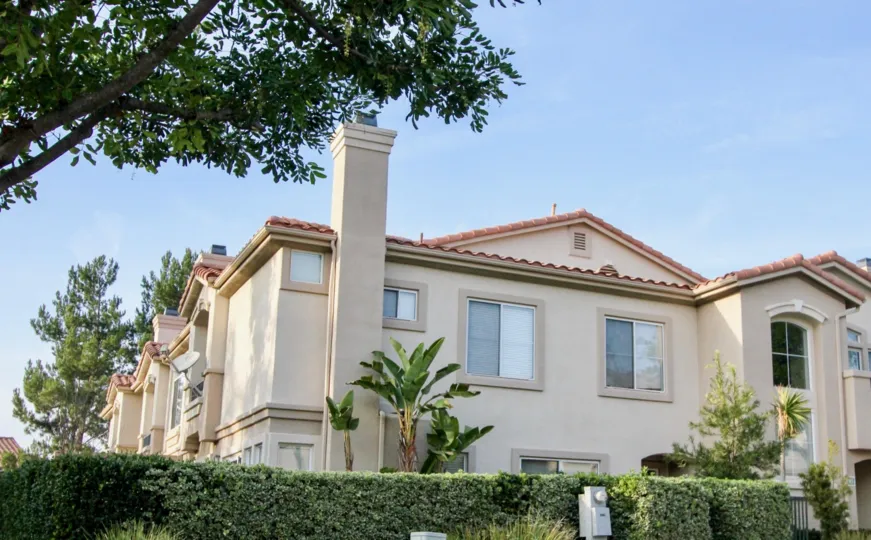 Hedges and apartment in La Ventana in Rancho Santa Margarita, CA