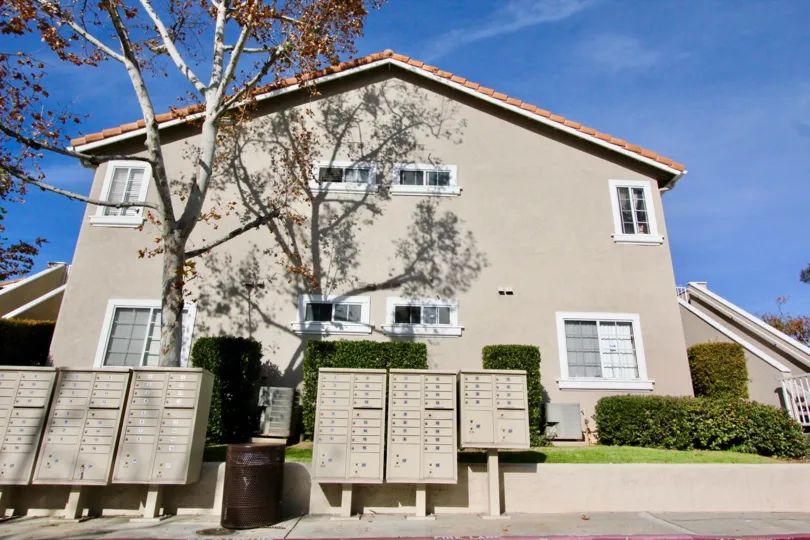 A grey building with mailboxes in the front in Las Flores community in Rancho Santa Margarita, California.