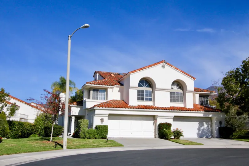 THE HOUSE IN THE MARBELLA WITH THE STREET LIGHT, LAWN, SHUTTER, PLANTS