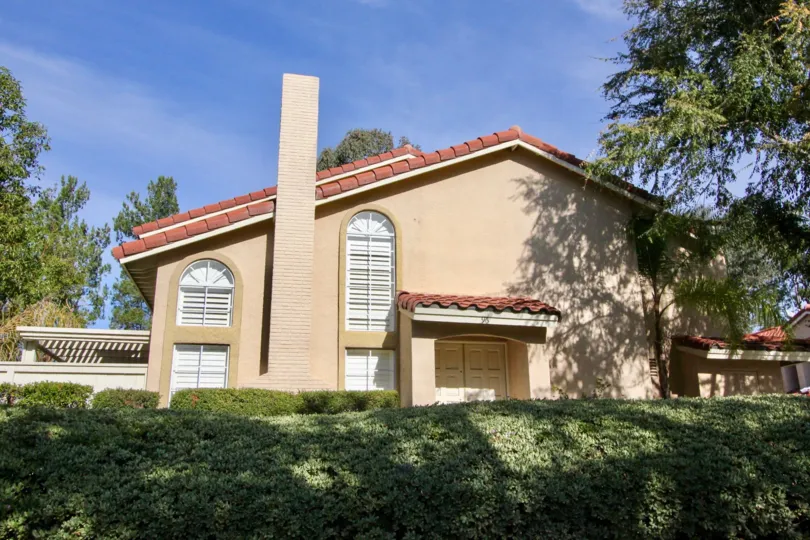 Sunny day with trees and plants in Mission Greens of Rancho Santa Margarita