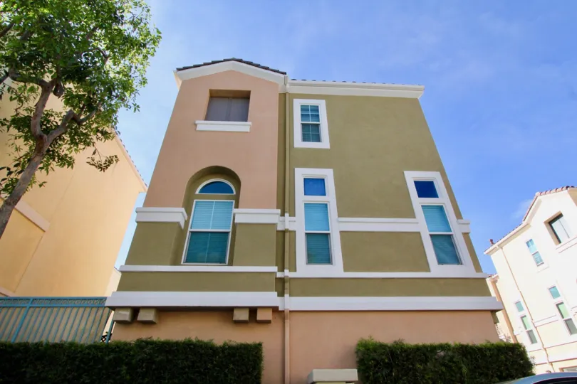 A three story colorful house in Montana Del Lago in Rancho Santa Margarita, CA