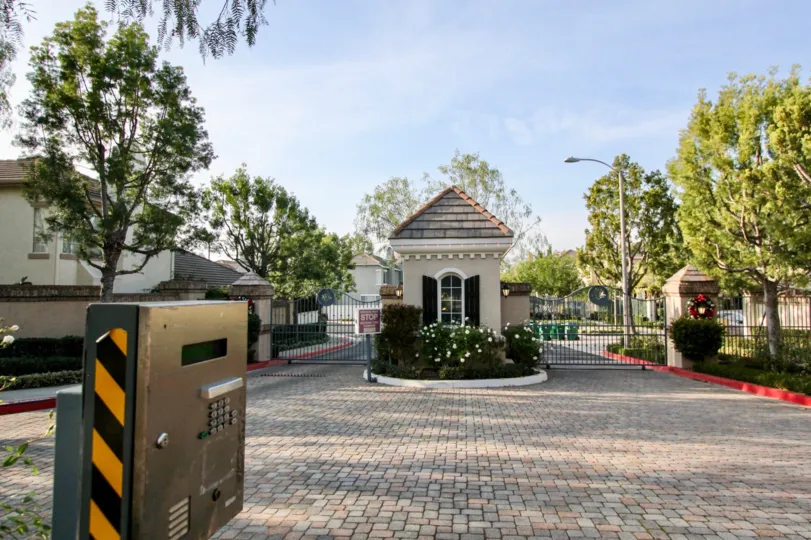 The private gated entrance to Sea Country with call box and guard shack