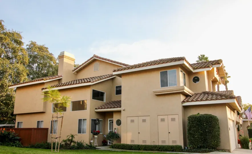 The Spanish syle residences at Sierra Verde with community landscaping and garage parking