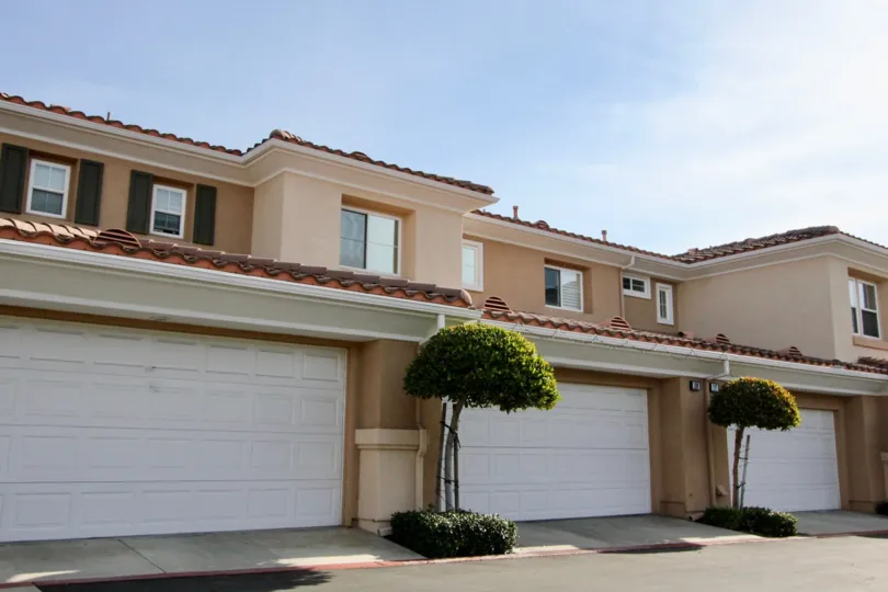 Multi family housing units with garages and tiled roofs in the community of Terracina in the City of Rancho Santa Margarita, California