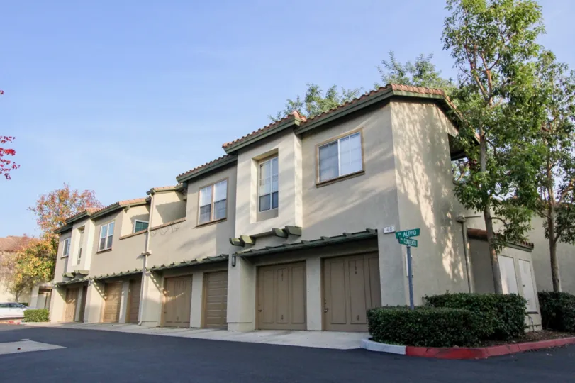 Roomy single garage entrances at theTijeras Creek Vilas