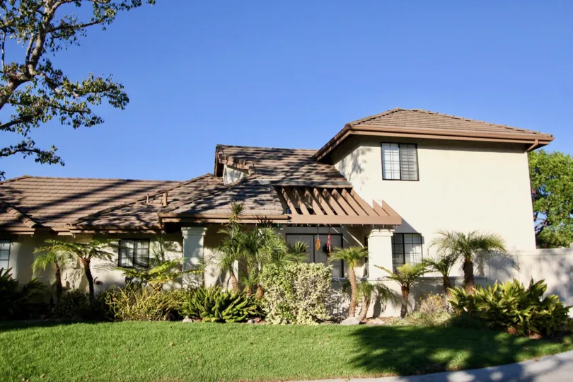 THE FLAT IN THE COLONY AT FORSTER WITH THE PLANTS, TREES, GRASSLAND