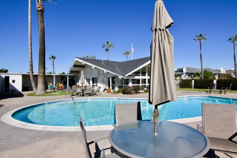 There is vast area around the blue colour swimming pool in Colony Cove