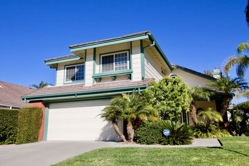 Detached units with front lawn, two car garages and lush landscaping at the HIghland LIght Village