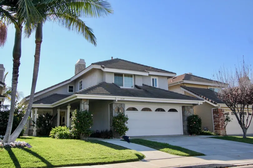 This beautiful well kept home is 3 bedroom 2 1/2 bath and situated on The home is light and bright with a formal dining area, living room, fireplace. Family room, breakfast nook, bar area, laundry with inside hookups and 1/2 bath on the lower level.