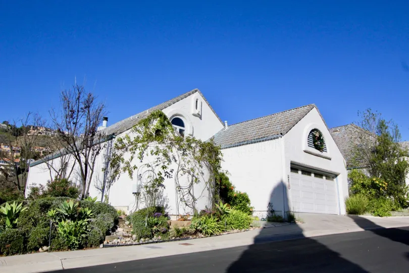 Detached homes with well-maintained landscaping at the Las Marias community