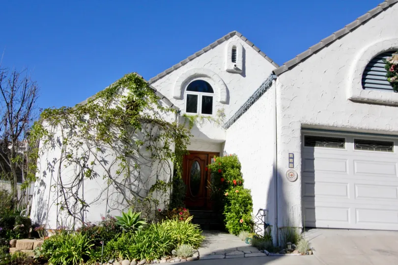 Distinctive and impressive entryways with adjacent garages at the Las Marias