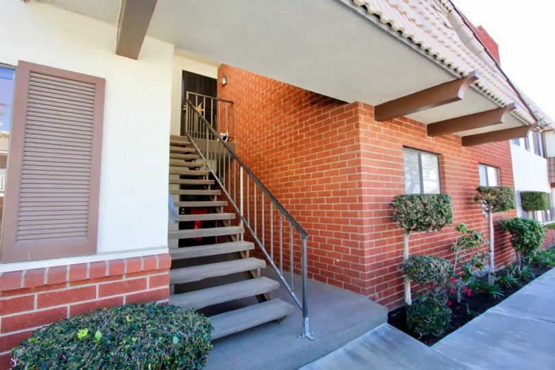 Flight of stairs in a bricked house in Parkview Manor.