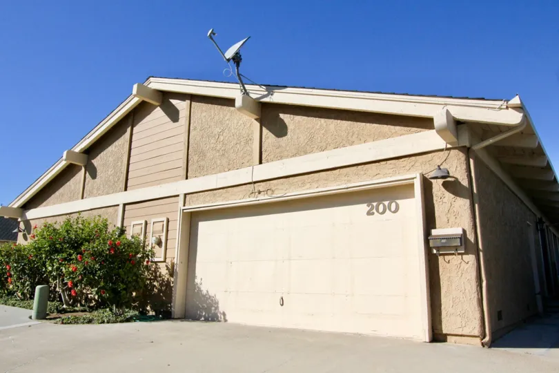 A television dish set at the top of the slanting roof in President Heights I.