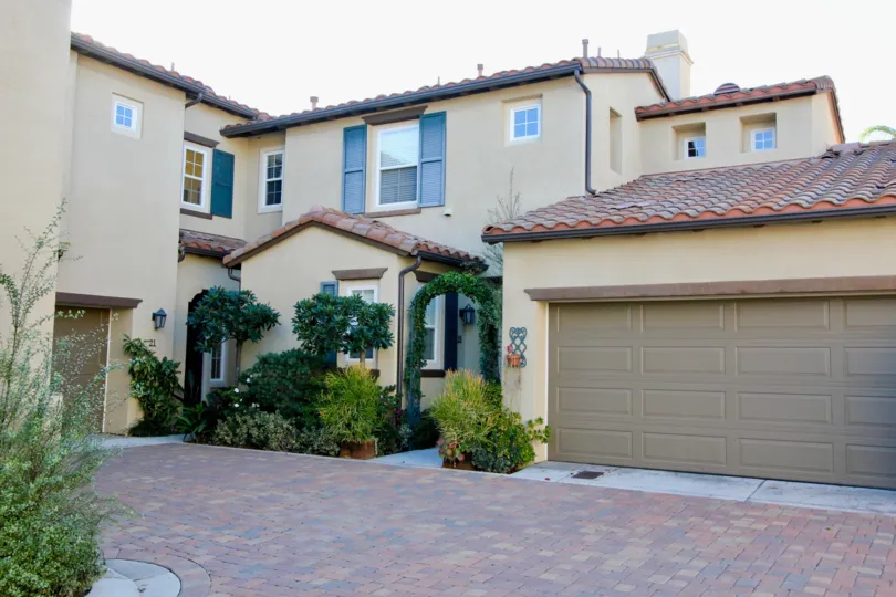 Sunny day in Santalana with this beautiful detached sandstone home with red-clay shingles