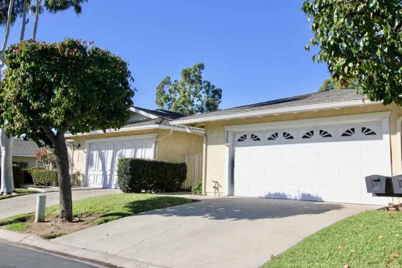 Seascape Village Single Level with attached two car garage. This property is move in ready! New paint throughout, Bamboo flooring, newer windows and sliders. Two bedrooms, a den with built ins, formal dining, living room and kitchen over looking a patio. 