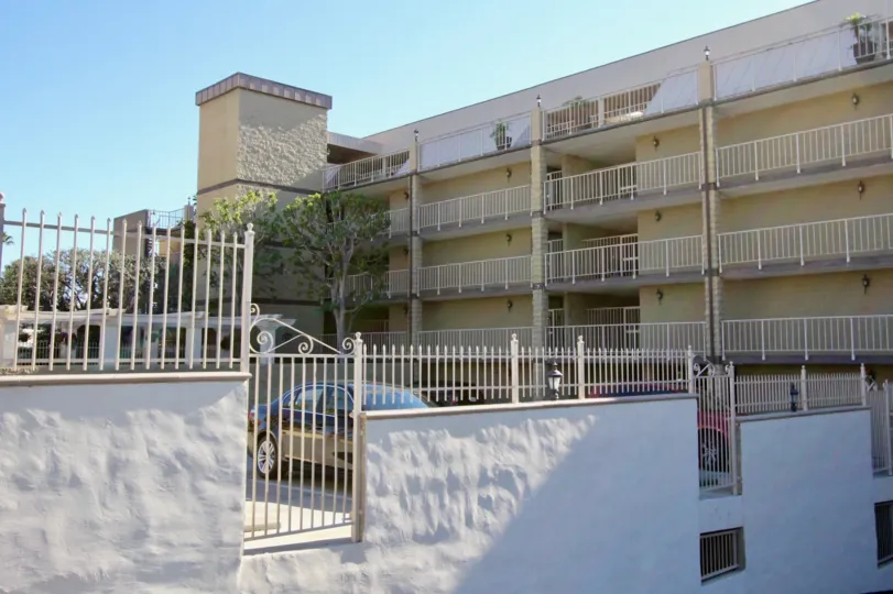 it is known for its ocean, hill, and mountain views, a pleasant climate and its Spanish Colonial style architecture.