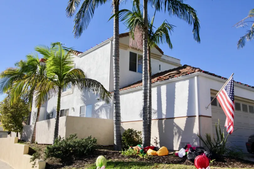 The Villagio in the San Clemente with a house holding a U. S Flag