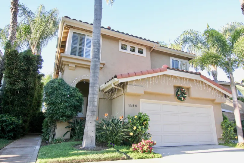 Front door and lawn in Villamar in San Clemente, CA