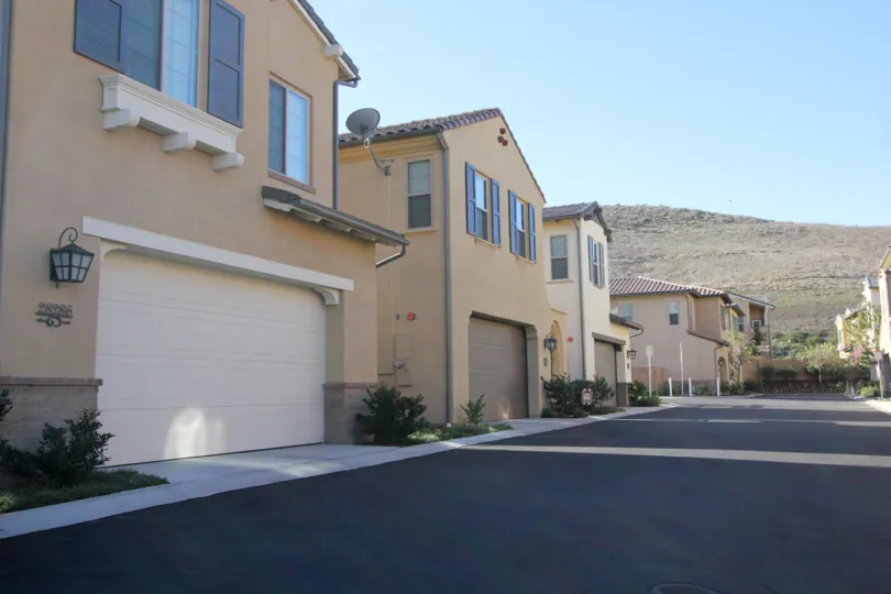 Road and homes in Campanilla in San Juan Capistrano, CA