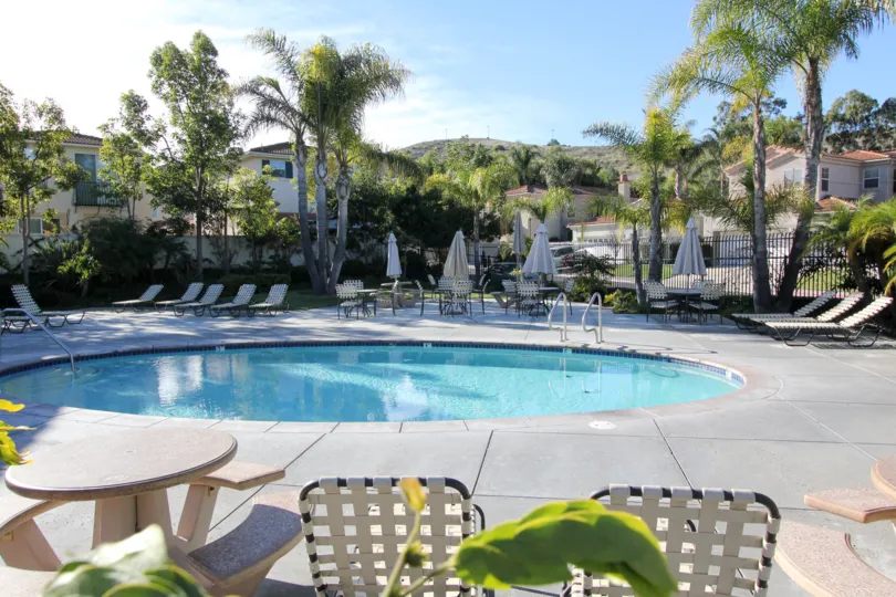 Crystal clear pool at the Campanilla community on a sunny day