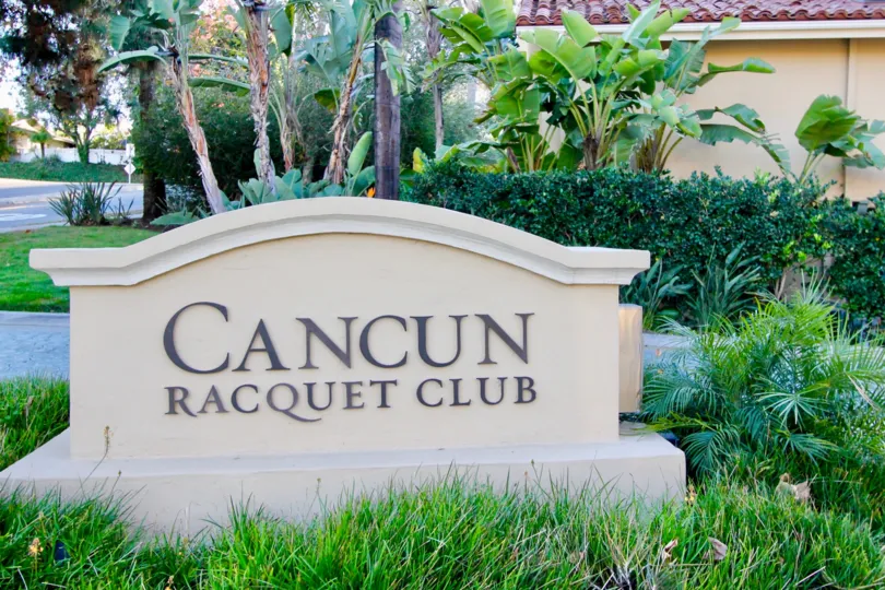The welcome sign at Cancun Racquet Club in San Juan Capistrano, CA