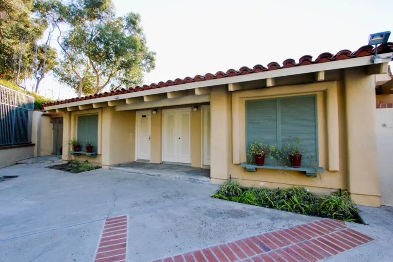 Driveway and doors in Cancun Racquet Club in San Juan Capistrano, CA