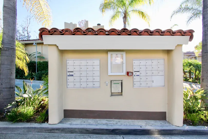Trees and a mailbox at Cancun Racquet Club in San Juan Capistrano, CA