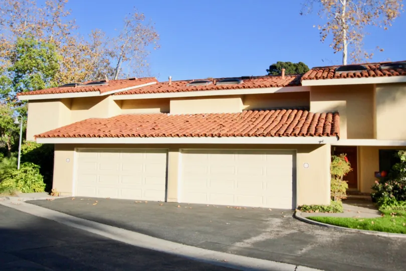 Accessable front garages adorned by adobe style roofs