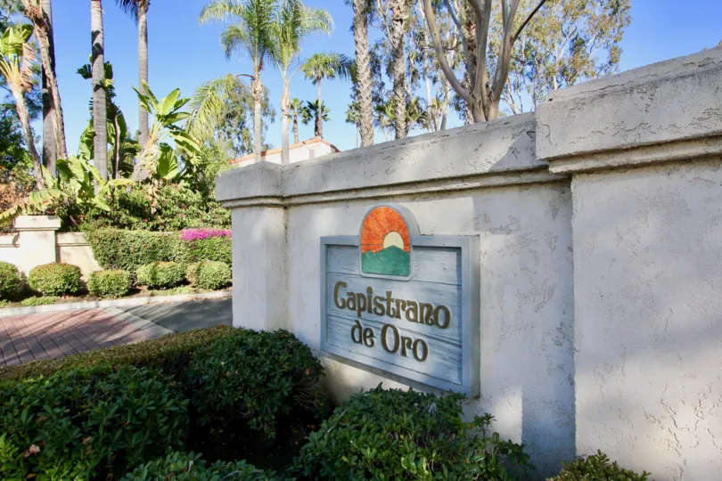 Plants and front sign at Capistrano D'Oro in San Juan Capistrano, CA