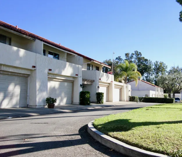 Apartments and garages in Casitas Capistrano on a sunny day