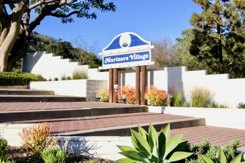 Steps and the front sign at Mariners Village in San Juan Capistrano, CA