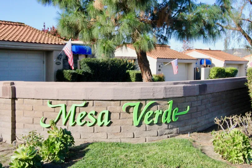 A sunny day in the Mesa Verde with flags and garden