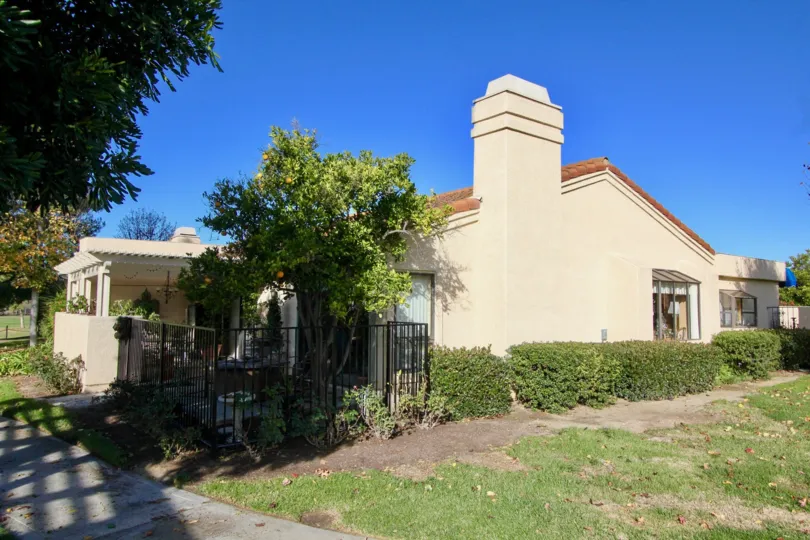 Housing in San Juan Capistrano, California. Community of Mesa Verde. Fenced in garden to relax.