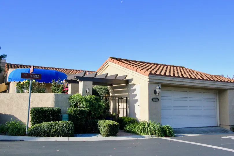 Home located at 32011 Via Flores in the Mesa Verde neighborhood with plenty of landscaping