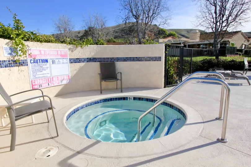Chair and hot tub at Mesa Verde in San Juan Capistrano, CA
