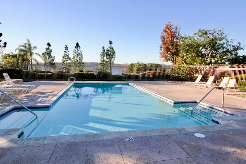 Fall trees and pool at San Juan Hills in San Juan Capistrano, CA