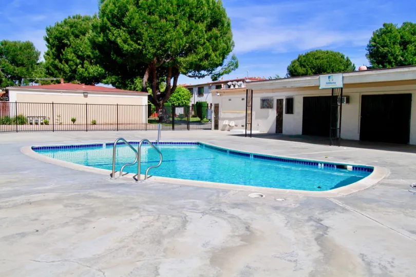 clean and clear swimming pool in side the compound in Bishop Manor
