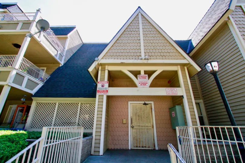 A beautiful large bunglow with blue sloped roofs in the Chestnut Square community
