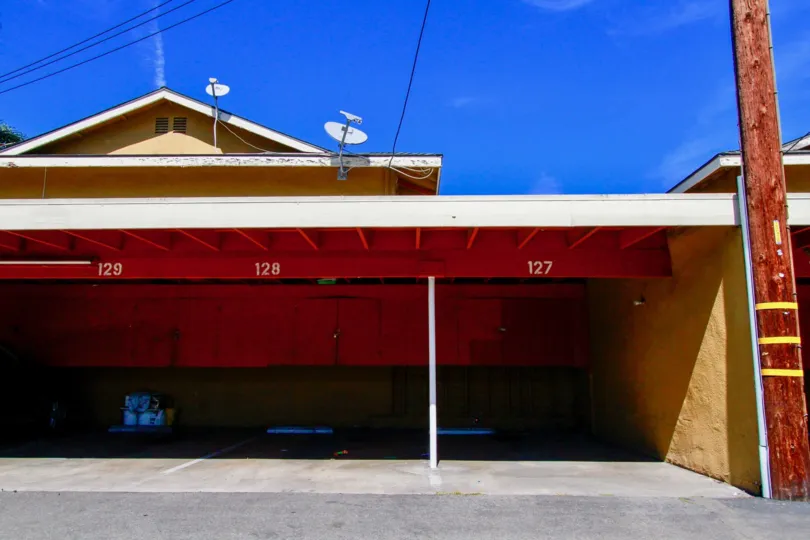 A beautiful day in the Fairlane Gardens in front of the garage.