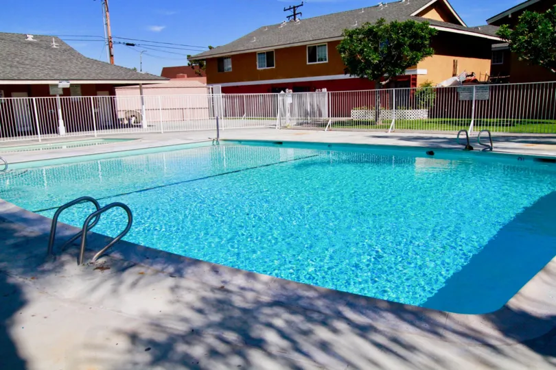 Gated swimming pool with kids pool in Fairlane Gardens community, Santa Ana, CA.