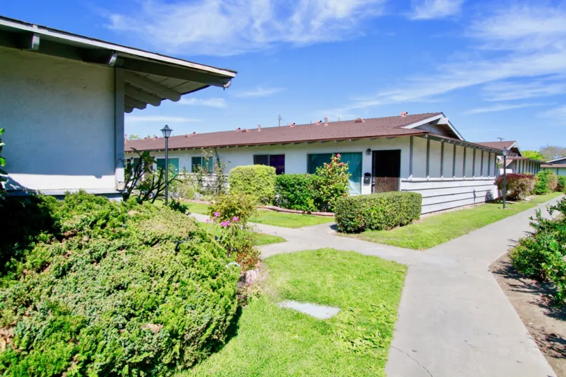 front yard view with plants and trees in arden Villas