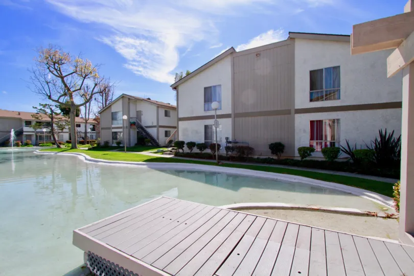 pool in side the compound having bunch and plats around in Lakeshore