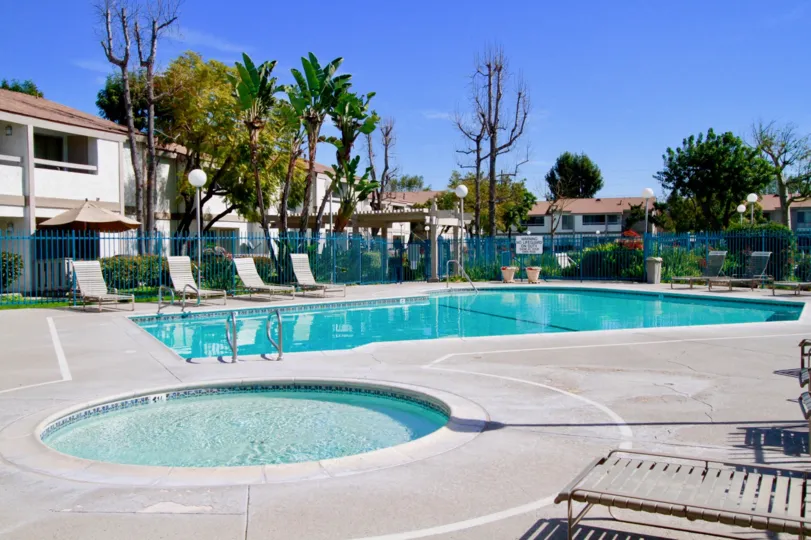swimming pool decorated with chairs and plants around in Lakeshore