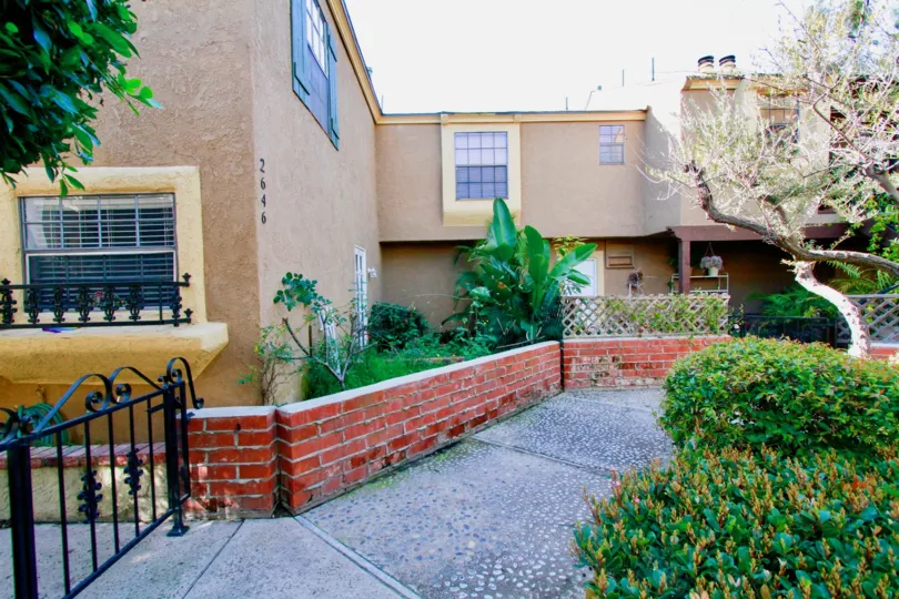 The back side view of the Los Quatros Condos Condominium complexes in Santa Ana, California