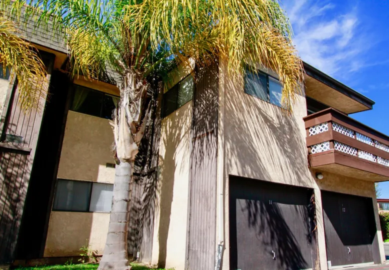 trees and plants around the building in Newhope Garden
