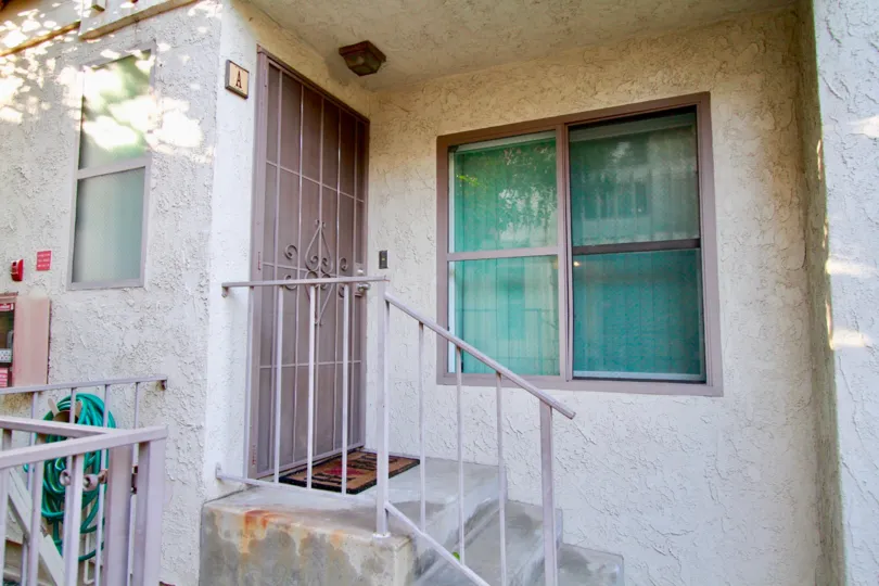 building in front of the garge in North Broadway Townhomes