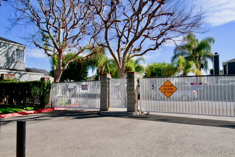 The houses in the old stonegate in santa ana is the very naturest city with trees and plants with elgant front gate and nature look