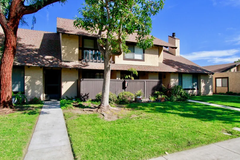 front yard decorated with trees and plant in front of the house in Park Glen