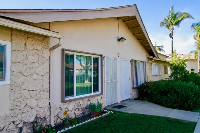 A sunny day outside of building in Regency Villas in Santa Ana, California