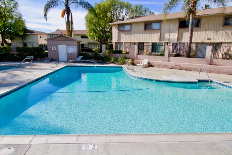 A great day in the Regency Villas with a swimming pool and building.